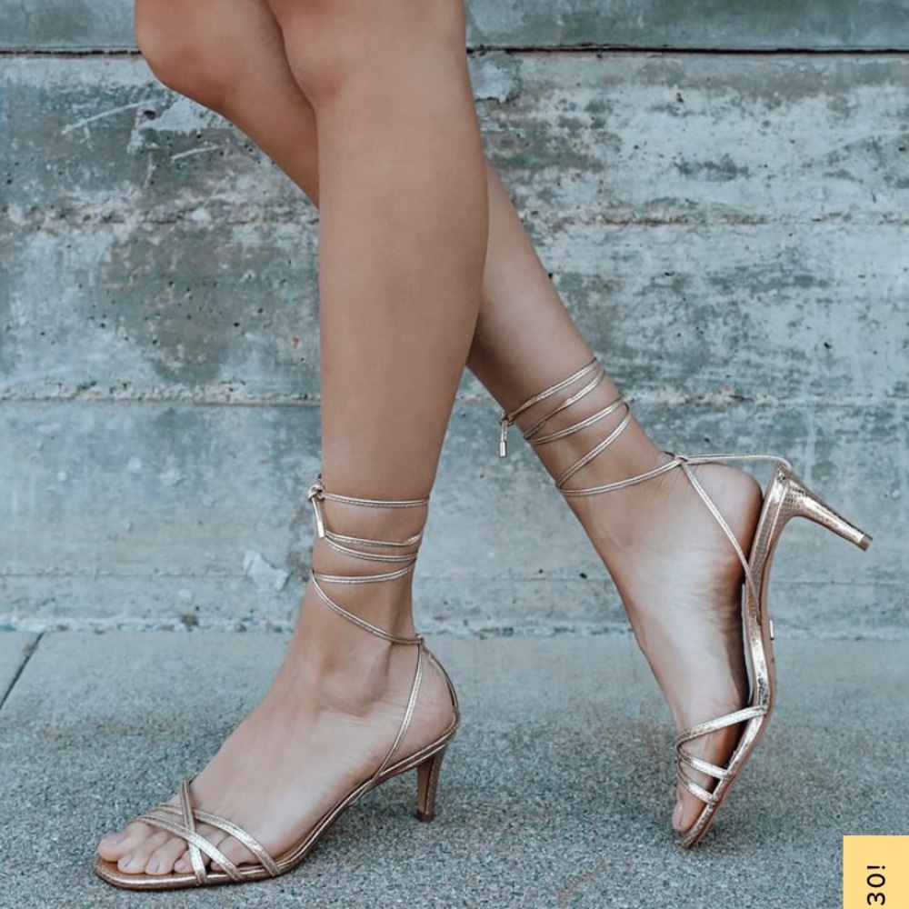 Never worn Lulu’s lace up gold heels